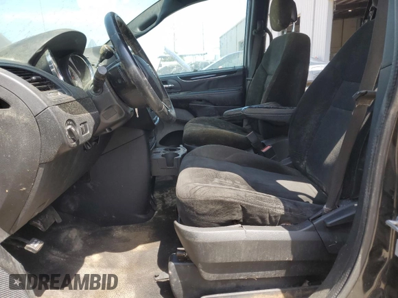 2015 Dodge Grand Caravan American Value with VIN 2C4RDGBG7FR703916, listed as a Copart auction lot 54830915 with 197,539 mi miles and Clean Title. Bid and sale history available at DreamBid. Image 7.