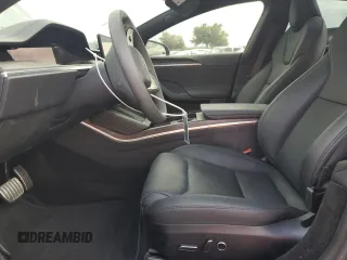 2024 Tesla Model S with VIN 5YJSA1E54RF536092, listed as a Copart auction lot 85934334 with 11,451 mi miles and Salvage title. Bid and sale history available at DreamBid. Image 7.