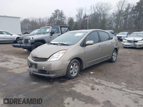 2005 Toyota Prius z VIN JTDKB20U553015603, wystawiony jako IAAI lot #41753696 z przebiegiem 299 999 mil mil oraz . Historia ofert i sprzedaży dostępna na DreamBid. Obrazek 2.