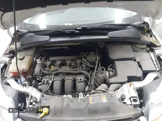 2014 Ford Focus SE with VIN 1FADP3F22EL437727, listed as a IAAI auction lot 42001593 with 90,814 mi miles. Bid and sale history available at carsss.com. Image 10.