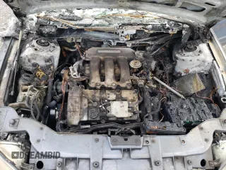 1999 Mercury Sable LS z VIN 1MEFM53S4XG649132, wystawiony jako Copart lot #70168934 z przebiegiem Nie podano mil oraz Nie do naprawy. Historia ofert i sprzedaży dostępna na DreamBid. Obrazek 11.