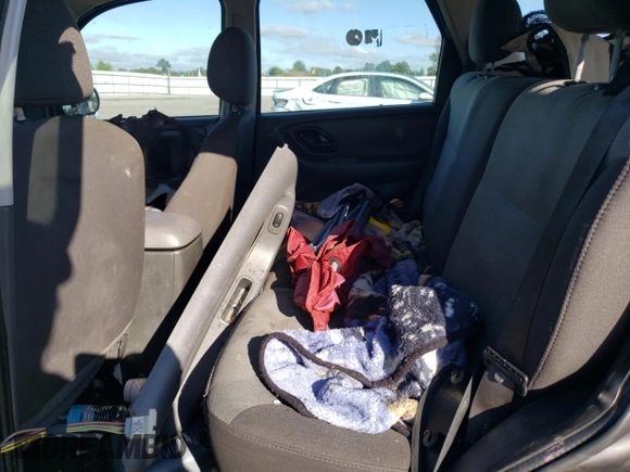 2004 Ford Escape XLS with VIN 1FMYU92134KA21707, listed as a Copart auction lot 72114804 with 219,518 mi miles and Salvage Title. Bid and sale history available at DreamBid. Image 11.