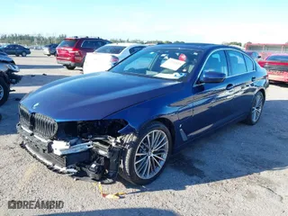 2019 BMW 5 Series 530e iPerformance with VIN WBAJA9C50KB393760, listed as a IAAI auction lot 41426819 with 36,944 mi miles. Bid and sale history available at carsss.com. Image 2.