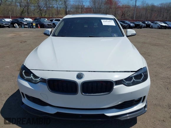 2013 BMW 3 Series 328i xDrive with VIN WBA3B5G53DNP40542, listed as a IAAI auction lot 42054817 with 70,924 mi miles and . Bid and sale history available at DreamBid. Image 12.