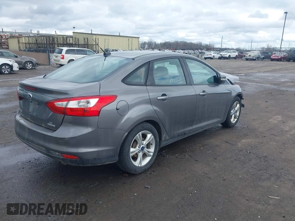 2013 Ford Focus SE with VIN 1FADP3F27DL233262, listed as a IAAI auction lot 41734903 with 149,680 mi miles. Bid and sale history available at carsss.com. Image 4.