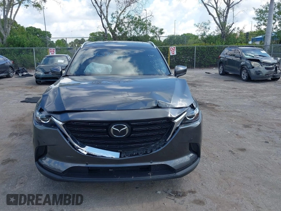 2022 Mazda CX-9 Touring Plus with VIN JM3TCBAY9N0624575, listed as a IAAI auction lot 42326284 with 16,572 mi miles and . Bid and sale history available at DreamBid. Image 12.
