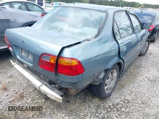 2000 Honda Civic VP with VIN 2HGEJ6614YH581615, listed as a IAAI auction lot 41902740 with 236,478 mi miles. Bid and sale history available at carsss.com. Image 4.