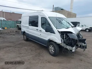 2015 Ford Transit Cargo z VIN 1FTNR2CM4FKA84584, wystawiony jako IAAI lot #42008193 z przebiegiem 224 453 mil mil oraz . Historia ofert i sprzedaży dostępna na DreamBid. Obrazek 1.