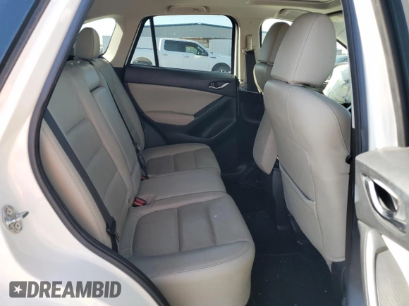 2015 Mazda CX-5 Grand Touring with VIN JM3KE2DY1F0453386, listed as a Copart auction lot 50580185 with 174,309 mi miles and Salvage Title. Bid and sale history available at carsss.com. Image 11.