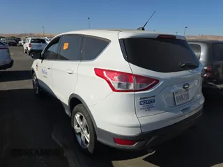 2013 Ford Escape SE z VIN 1FMCU9GX2DUB46936, wystawiony jako IAAI lot #42792269 z przebiegiem 196 885 mil mil oraz . Historia ofert i sprzedaży dostępna na DreamBid. Obrazek 33.