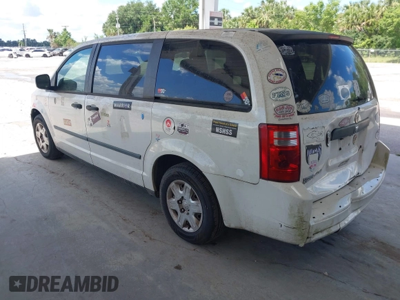 2008 Dodge Grand Caravan SE with VIN 1D8HN44H98B126418, listed as a IAAI auction lot 42223290 with 317,457 mi miles and . Bid and sale history available at DreamBid. Image 3.