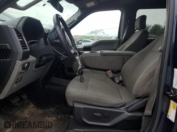 2019 Ford F-150 XL with VIN 1FTEW1E55KFC10642, listed as a Copart auction lot 62811755 with 128,286 mi miles and Salvage title. Bid and sale history available at DreamBid. Image 7.