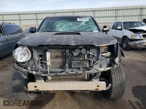 2009 Toyota Tacoma z VIN 3TMLU42N09M030420, wystawiony jako Copart lot #84889784 z przebiegiem 322 393 mil mil oraz Szkoda całkowita • Salvage title. Historia ofert i sprzedaży dostępna na DreamBid. Obrazek 5.