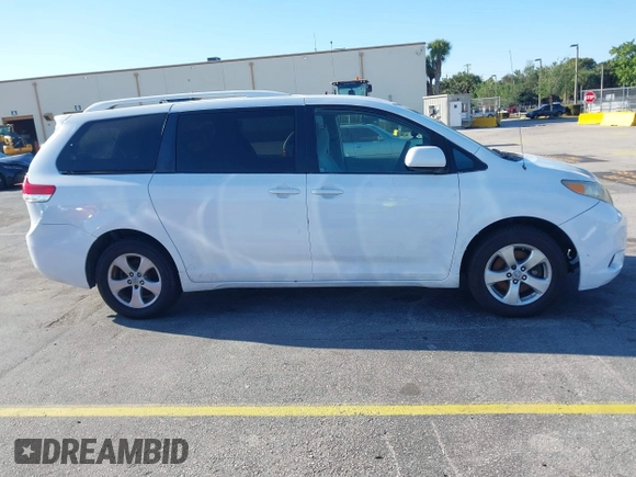 2012 Toyota Sienna with VIN 5TDKA3DC5CS011220, listed as a IAAI auction lot 41770493 with 199,266 mi miles and . Bid and sale history available at DreamBid. Image 13.