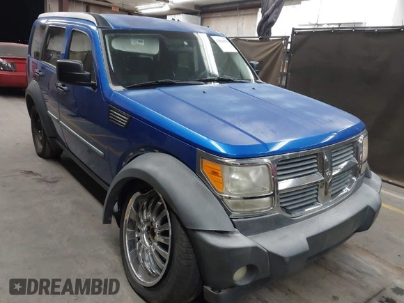 2007 Dodge Nitro SXT with VIN 1D8GT28K47W733488, listed as a IAAI auction lot 42021076 with 120,862 mi miles. Bid and sale history available at carsss.com. Image 1.