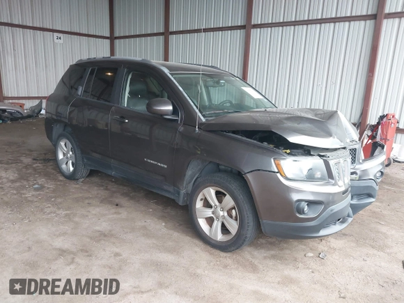 2016 Jeep Compass Latitude with VIN 1C4NJCEA2GD599833, listed as a IAAI auction lot 41507729 with 107,187 mi miles. Bid and sale history available at carsss.com. Image 1.