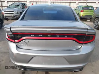 2015 Dodge Charger SXT with VIN 2C3CDXHG4FH884058, listed as a IAAI auction lot 41724894 with 202,701 mi miles and . Bid and sale history available at DreamBid. Image 17.