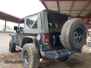 2011 Jeep Wrangler Rubicon with VIN 1J4BA6D13BL545343, listed as a IAAI auction lot 40980056 with 107,207 mi miles and . Bid and sale history available at carsss.com. Image 3.