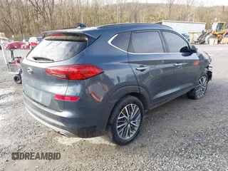 2019 Hyundai Tucson Ultimate with VIN KM8J3CAL6KU042315, listed as a IAAI auction lot 41924215 with 105,333 mi miles. Bid and sale history available at carsss.com. Image 4.