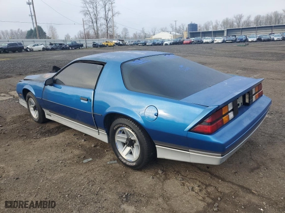 1985 Chevrolet Camaro Z28 Sport with VIN 1G1FP87H2FN114697, listed as a Copart auction lot 89329895 with 0 mi miles and Salvage Title. Bid and sale history available at carsss.com. Image 2.