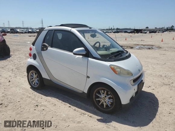 2009 Smart fortwo Passion z VIN WMEEK31X99K257464, wystawiony jako Copart lot #55807575 z przebiegiem 49 851 mil mil oraz Tytuł czysty. Historia ofert i sprzedaży dostępna na DreamBid. Obrazek 4.