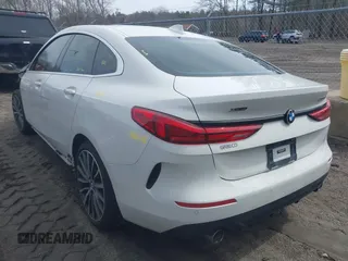 2020 BMW 2 Series 228i xDrive with VIN WBA73AK0XL7F65361, listed as a IAAI auction lot 41784834 with 61,856 mi miles. Bid and sale history available at carsss.com. Image 3.
