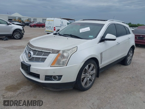 2012 Cadillac SRX Premium Collection with VIN 3GYFNCE32CS579256, listed as a IAAI auction lot 42660666 with 125,236 mi miles and . Bid and sale history available at DreamBid. Image 2.