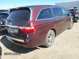 2013 Honda Odyssey EX-L with VIN 5FNRL5H61DB017398, listed as a IAAI auction lot 41689227 with 159,361 mi miles and . Bid and sale history available at carsss.com. Image 4.