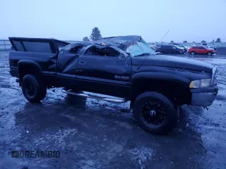 1999 Dodge Ram 2500 with VIN 1B7KF2367XJ653030, listed as a Copart auction lot 87110154 with 0 mi miles and Salvage Title. Bid and sale history available at carsss.com. Image 4.