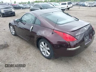 2003 Nissan 350Z Performance z VIN JN1AZ34D73T115371, wystawiony jako IAAI lot #42183650 z przebiegiem 113 331 mil mil oraz . Historia ofert i sprzedaży dostępna na DreamBid. Obrazek 3.