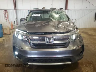 2019 Honda Pilot EX-L z VIN 5FNYF6H58KB100677, wystawiony jako Copart lot #61347595 z przebiegiem 59 987 mil mil oraz Szkoda całkowita • Salvage title. Historia ofert i sprzedaży dostępna na DreamBid. Obrazek 5.