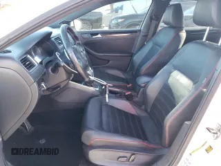 2014 Volkswagen Jetta GLI with VIN 3VW4T7AJ8EM287825, listed as a Copart auction lot 61809114 with 123,305 mi miles and Salvage title. Bid and sale history available at DreamBid. Image 7.
