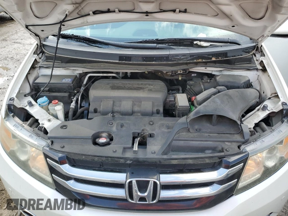2014 Honda Odyssey Touring with VIN 5FNRL5H97EB097771, listed as a Copart auction lot 51664455 with 109,830 mi miles and Salvage Title. Bid and sale history available at DreamBid. Image 12.