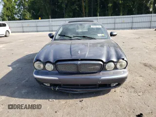 2004 Jaguar XJ with VIN SAJWA71CX4SG32785, listed as a Copart auction lot 69792134 with 183,705 mi miles and Non Repairable. Bid and sale history available at carsss.com. Image 5.