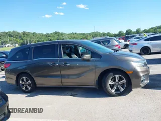2018 Honda Odyssey Touring с VIN 5FNRL6H80JB010624, выставлен на аукционе IAAI как лот 42306968 с пробегом 107 749 миль миль и . История ставок и продаж доступна на DreamBid. Изображение 13.