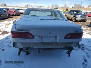 1993 Ford Taurus z VIN 1FACP5242PG162676, wystawiony jako Copart lot #45177445 z przebiegiem 73 771 mil mil oraz Nie do naprawy • Non repairable. Historia ofert i sprzedaży dostępna na DreamBid. Obrazek 6.