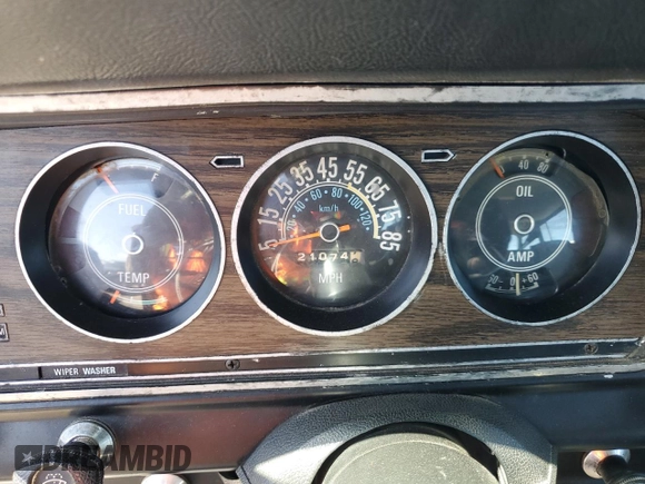 1976 Jeep Grand Wagoneer с VIN J6A15MZ101311, выставлен на аукционе Copart как лот 72651174 с пробегом 21 074 миль миль и Списание • Salvage title. История ставок и продаж доступна на DreamBid. Изображение 9.
