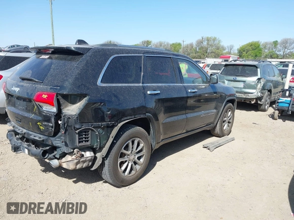 2014 Jeep Grand Cherokee Limited with VIN 1C4RJEBM4EC353610, listed as a IAAI auction lot 41830079 with 168,160 mi miles. Bid and sale history available at carsss.com. Image 4.