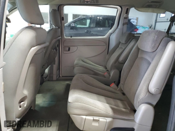 2005 Dodge Caravan SXT with VIN 2D4GP44L65R438530, listed as a Copart auction lot 63415955 with 220,852 mi miles and Salvage title. Bid and sale history available at DreamBid. Image 11.