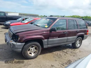 1997 Jeep Grand Cherokee Laredo with VIN 1J4GZ58S4VC702040, listed as a IAAI auction lot 42165536 with 121,803 mi miles and . Bid and sale history available at DreamBid. Image 15.