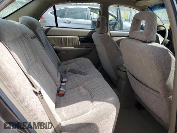 2003 Buick Regal LS z VIN 2G4WB52K731166956, wystawiony jako Copart lot #54233005 z przebiegiem 192 207 mil mil oraz Nie do naprawy • Non repairable. Historia ofert i sprzedaży dostępna na DreamBid. Obrazek 10.