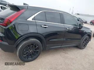 2023 Cadillac XT4 FWD Luxury with VIN 1GYAZAR49PF128552, listed as a IAAI auction lot 41806172 with 36,081 mi miles and . Bid and sale history available at carsss.com. Image 14.
