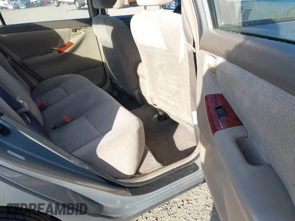 2004 Toyota Corolla CE with VIN JTDBR38E842043849, listed as a IAAI auction lot 41703290 with 299,999 mi miles. Bid and sale history available at carsss.com. Image 8.