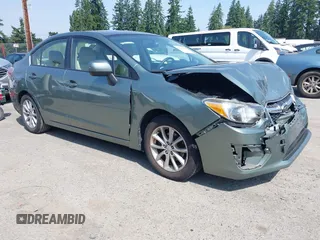 2014 Subaru Impreza Premium with VIN JF1GJAC67EH026904, listed as a IAAI auction lot 42586279 with 79,711 mi miles and . Bid and sale history available at DreamBid. Image 1.