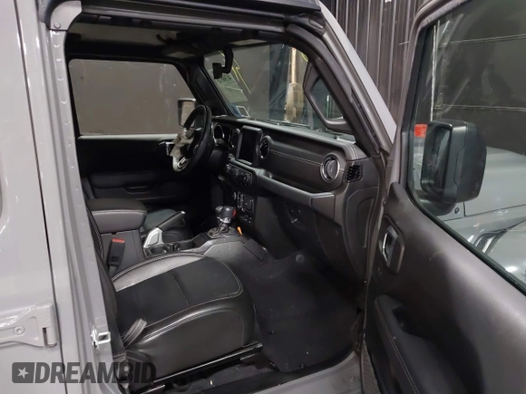 2022 Jeep Wrangler Unlimited Sahara with VIN 1C4JJXP66NW198723, listed as a IAAI auction lot 41368728 with 31,814 mi miles and . Bid and sale history available at DreamBid. Image 5.