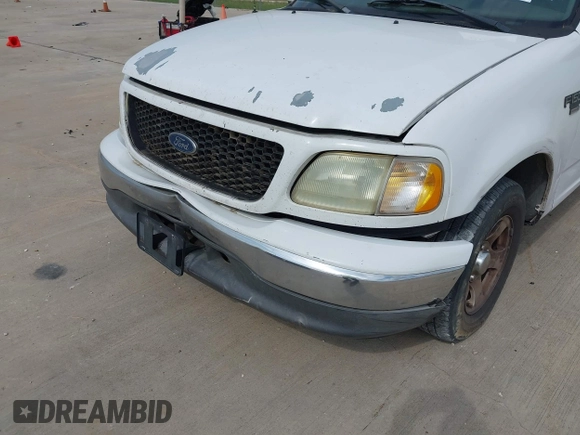 2003 Ford F-150 XLT with VIN 1FTRW07623KD58824, listed as a IAAI auction lot 42124403 with Not Provided miles. Bid and sale history available at carsss.com. Image 6.
