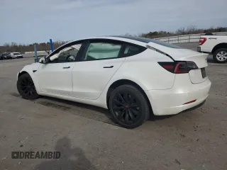 2021 Tesla Model 3 Standard Range Plus with VIN 5YJ3E1EA6MF048261, listed as a Copart auction lot 48680315 with Not Provided miles and Salvage Title. Bid and sale history available at DreamBid. Image 2.