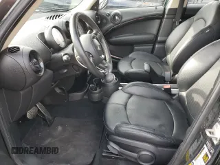 2014 MINI Countryman S z VIN WMWZC5C52EWP41173, wystawiony jako Copart lot #52725275 z przebiegiem 95 835 mil mil oraz Szkoda całkowita • Salvage title. Historia ofert i sprzedaży dostępna na DreamBid. Obrazek 7.