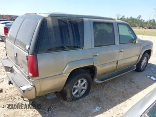 2000 Cadillac Escalade z VIN 1GYEK63R2YR209125, wystawiony jako IAAI lot #41854270 z przebiegiem 198 017 mil mil oraz . Historia ofert i sprzedaży dostępna na DreamBid. Obrazek 4.