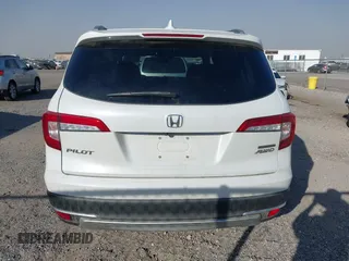2022 Honda Pilot Touring 7-Passenger with VIN 5FNYF6H67NB017660, listed as a IAAI auction lot 41194603 with 87,301 mi miles. Bid and sale history available at carsss.com. Image 16.